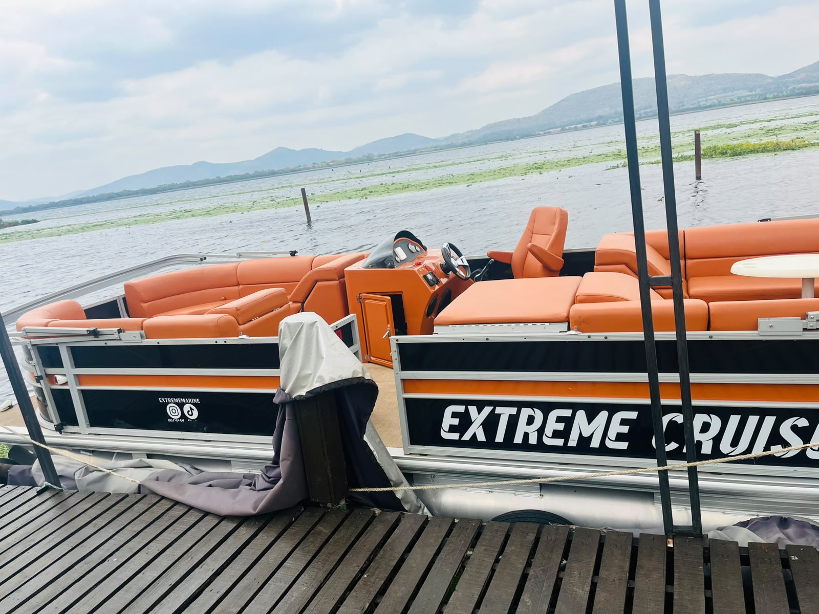 Extreme Cruises pontoon on the water